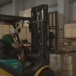 Komatsu forklift moving pallets with sliced veneer at the WoodWay Expert warehouse