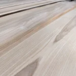 Texture of natural sliced olive ash veneer showing beautiful wood grain.