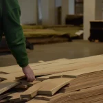 Sorting sliced olive ash veneer at the WoodWay Expert warehouse