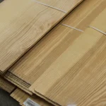 Marked packs of Sliced Olive Ash Veneer, 1st grade.