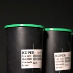 Label on the Kuper K12 glue thread spool with manufacturer marking