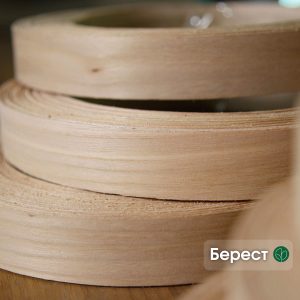 Рулони дубльованої кромки береста з написом «Берест» на фото