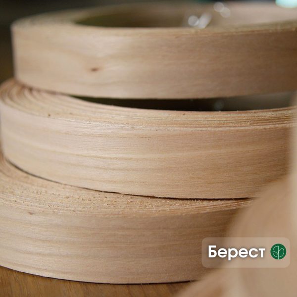 Рулони дубльованої кромки береста з написом «Берест» на фото