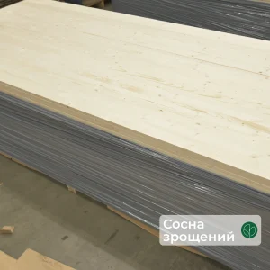 Пачки зрощеного меблевого щита із сосни в плівці на складі, фірмова плашка WoodWay